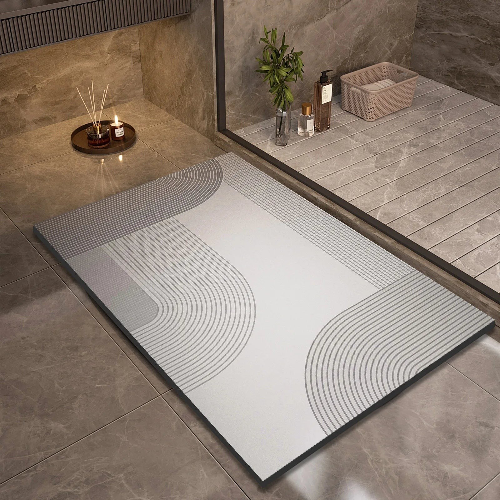 Ordenza Home absorbent suede bathroom mat with grey and white minimalist curved line pattern on a tiled floor