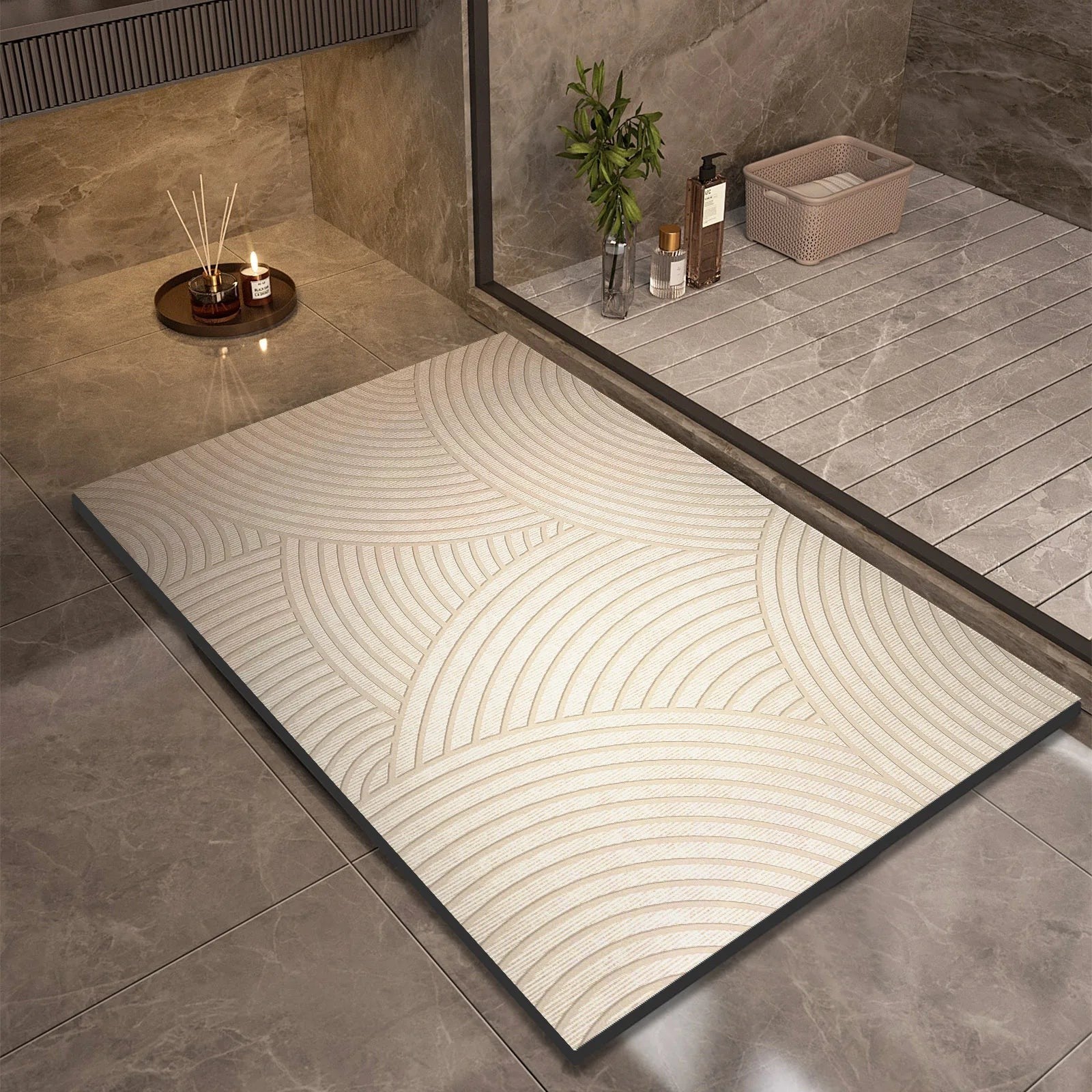 Ordenza Home beige suede bath mat with a geometric arc pattern on a tiled bathroom floor